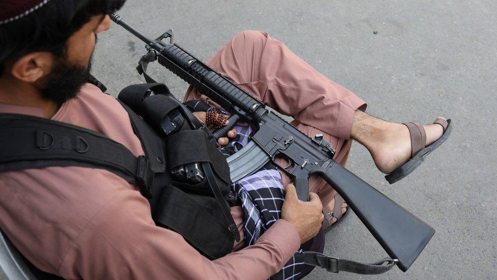 Taliban fighter holding his gun in Kabul