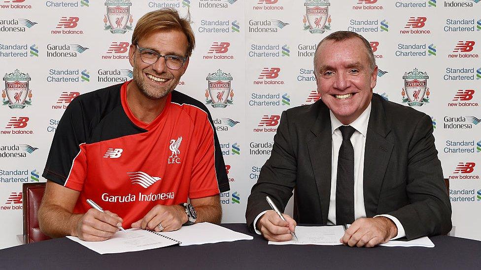 Jurgen Klopp signs with Liverpool.