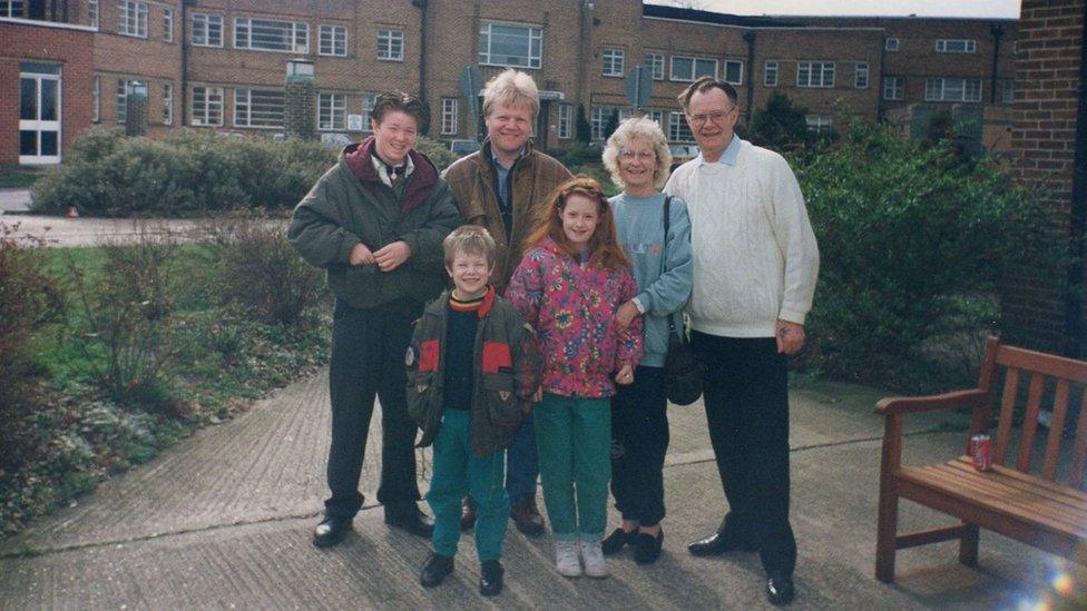 Michelle outside the hospital with family.