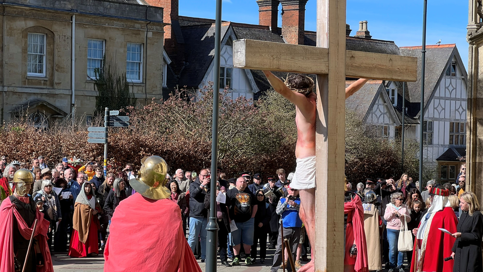 Re-enactment showing Jesus on a cross