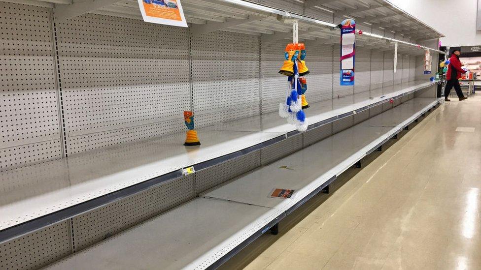 Empty shelves at a shop in Toronto, in March