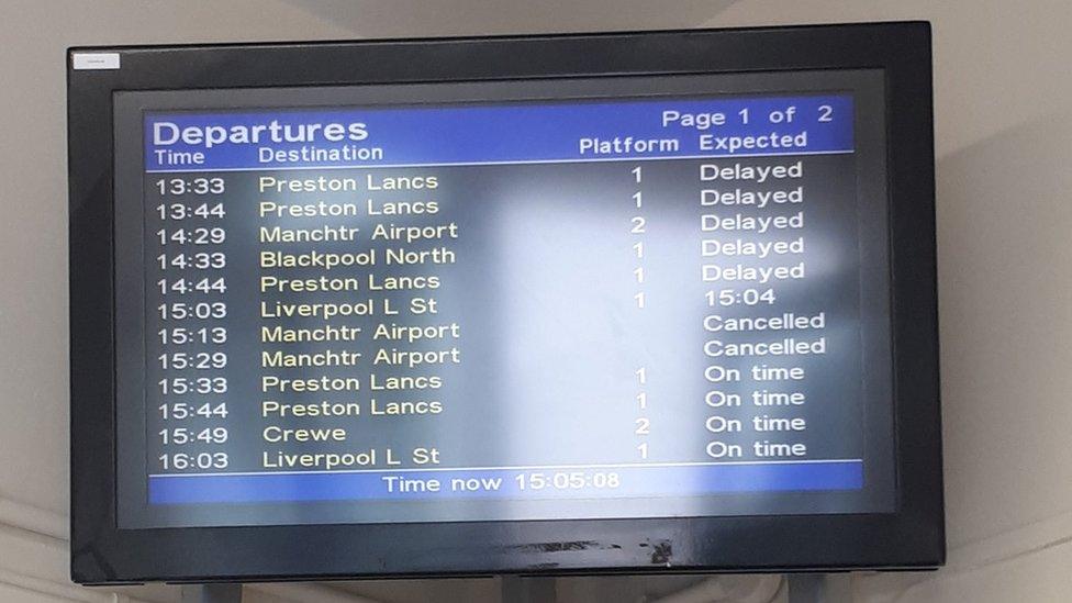 A board a Heald Green station in Greater Manchester