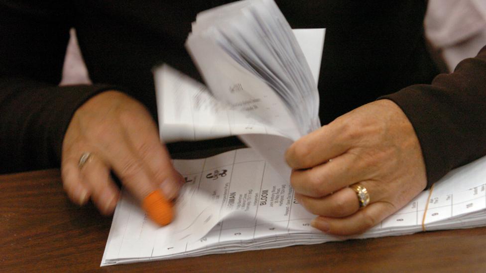 Hands counting votes on election night, 8 June 2017