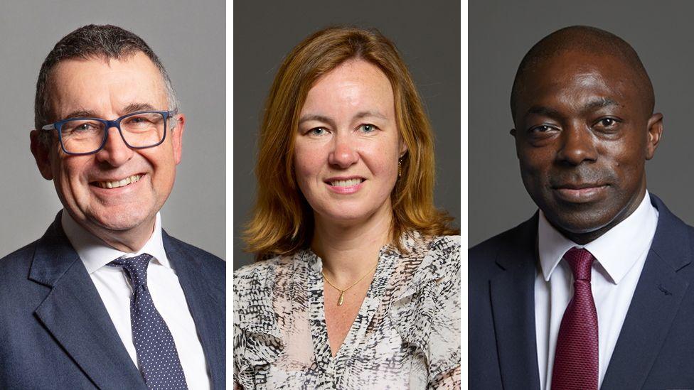 A picture of three portrait photos of three MPs. Sir Bernard Jenkin, on the left, is wearing a dark suit with a white shirt and a blue tie with small white dots on it. He is smiling at the camera and is wearing glasses. Marie Goldman is in the centre and smiling at the camera with a snakeskin black and white top and a gold pendant. Bayo Alaba, on the right, is in a suit and red tie and is smiling at the camera.