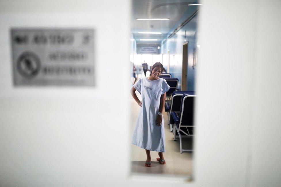 Carla, 18, a Venezuelan pregnant woman, poses before she gave birth to her baby at a maternity hospital in Boa Vista, Roraima state, Brazil, 21 August 2018.