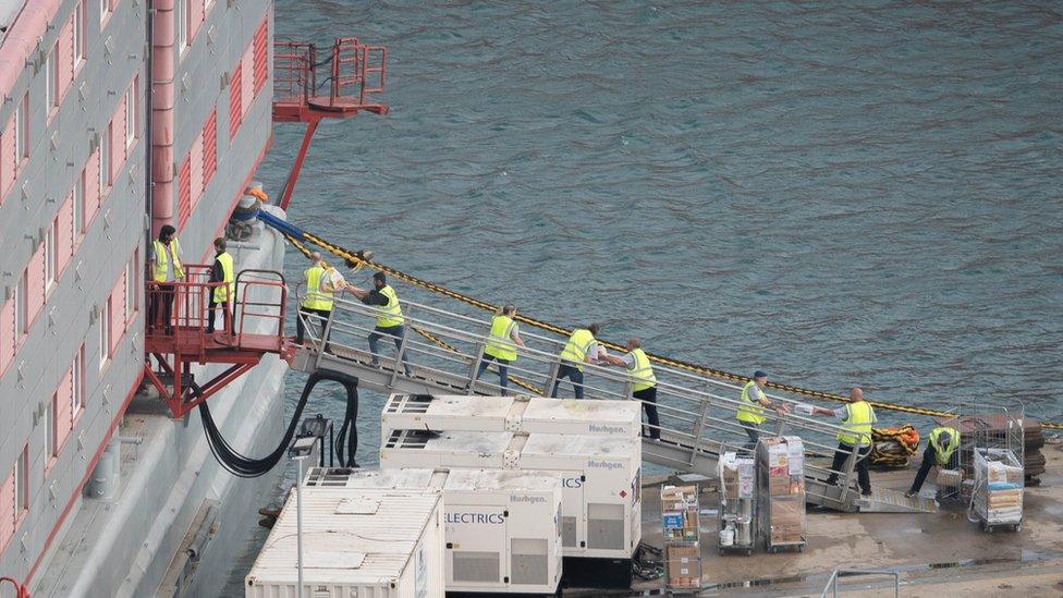 Food being loaded onto the ship on 2.8.23