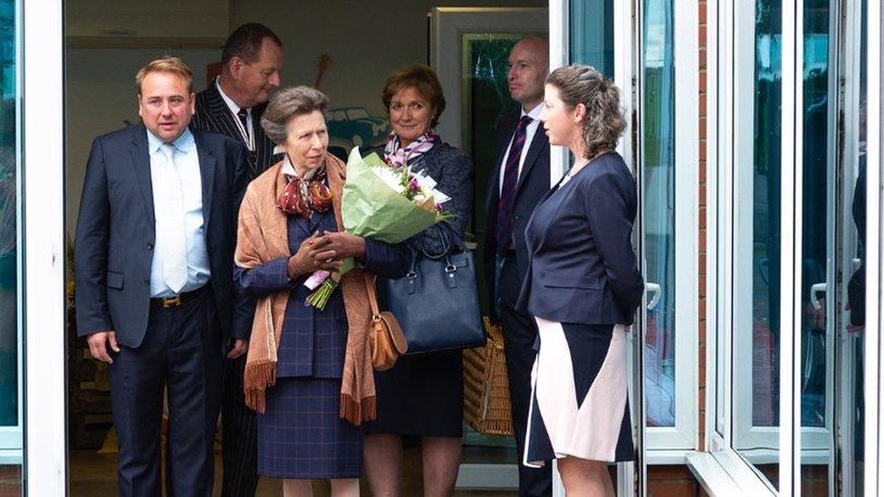 Mr Taylor (far left) pictured with Princess Anne at the factory in October