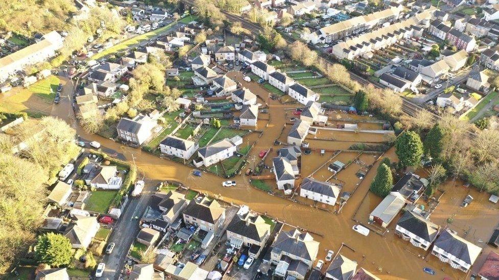 The homes when they were flooded in January