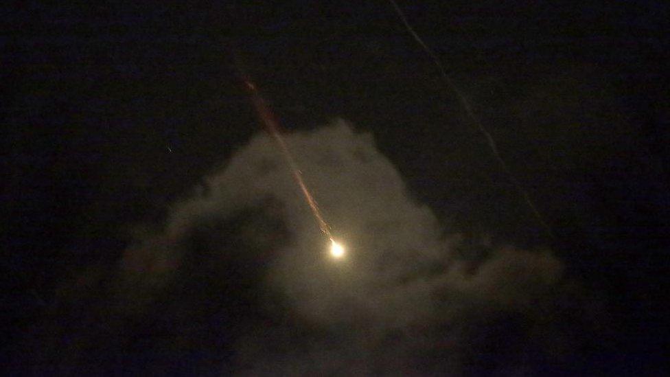 Drones or missiles in the sky over in southern Israel on 14 April 2024