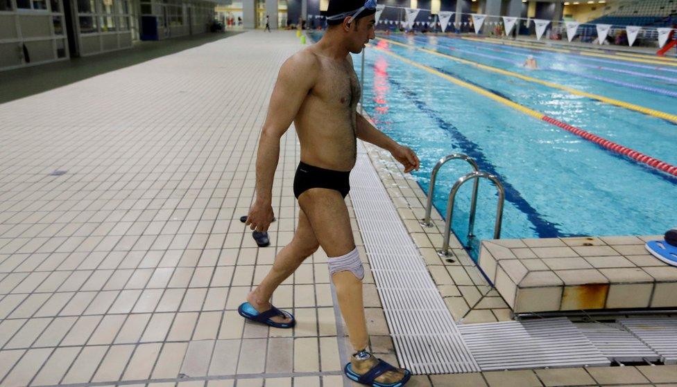 Syrian Ibrahim Al-Hussein practices during his training session at the Olympic Indoor swimming pool in Athens, Monday, April 25, 2016