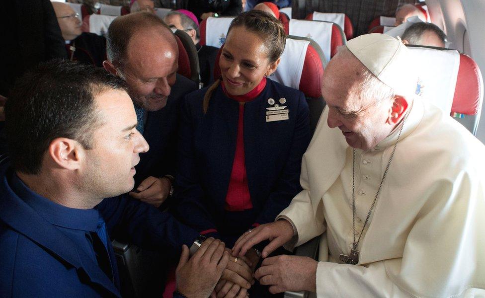 Pope Francis celebrates the marriage of crew members Paula Podest and Carlos Ciufffardi during the flight between Santiago and the northern city of Iquique, 18 January 2018