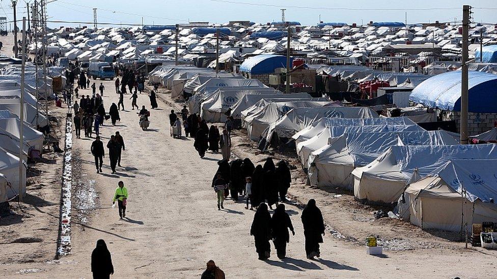 Women walk at al-Hol displacement camp in Hasaka governorate, Syria April 1, 2019.