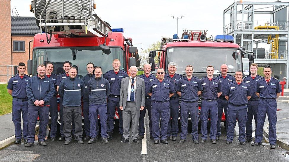 Fire crews with donated engines