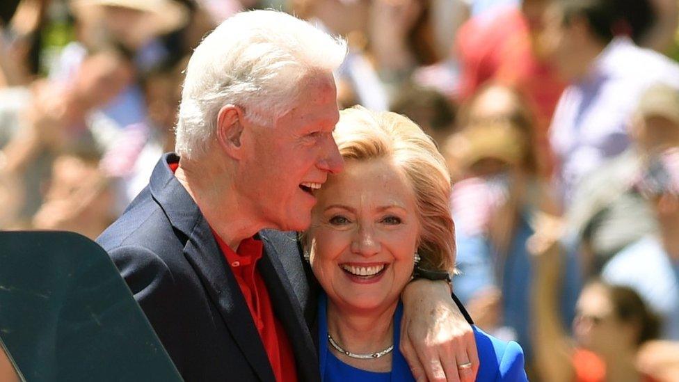 Former Secretary of State Hillary Clinton and Former US President Bill Clinton hug after she officially launched her campaign for the Democratic presidential nomination in 2015