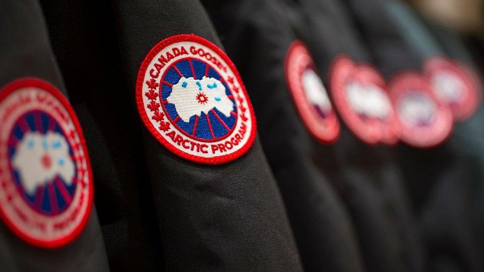 Canada Goose parkas hang on display