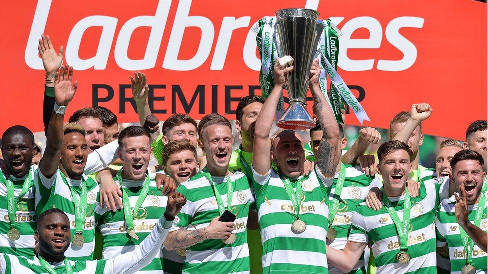 Celtic celebrate winning the Scottish Premiership