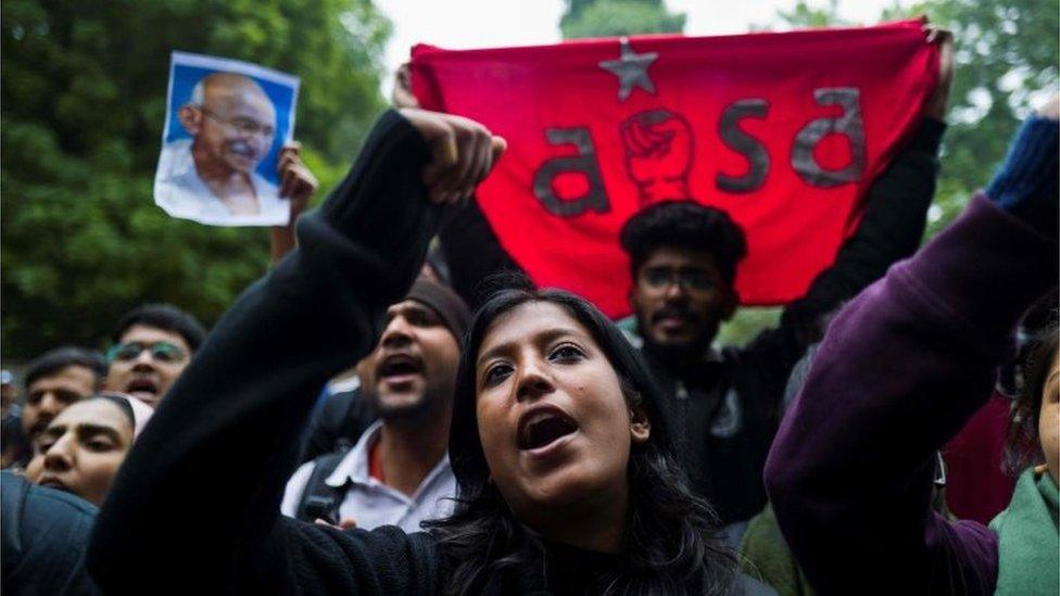 Demonstrators shout slogans to protest against the Indian government's Citizenship Amendment Bill (CAB) in New Delhi on December 16, 2019.