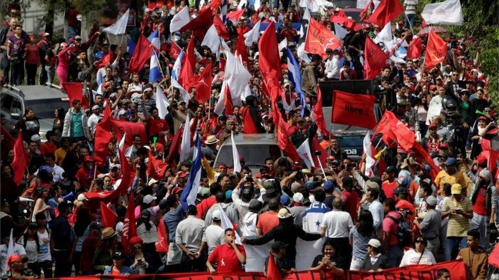 Supporters of Salvador Nasralla, presidential candidate for the Opposition Alliance Against the Dictatorship, take part during a march over a contested presidential election in Tegucigalpa, Honduras. December 10, 2017
