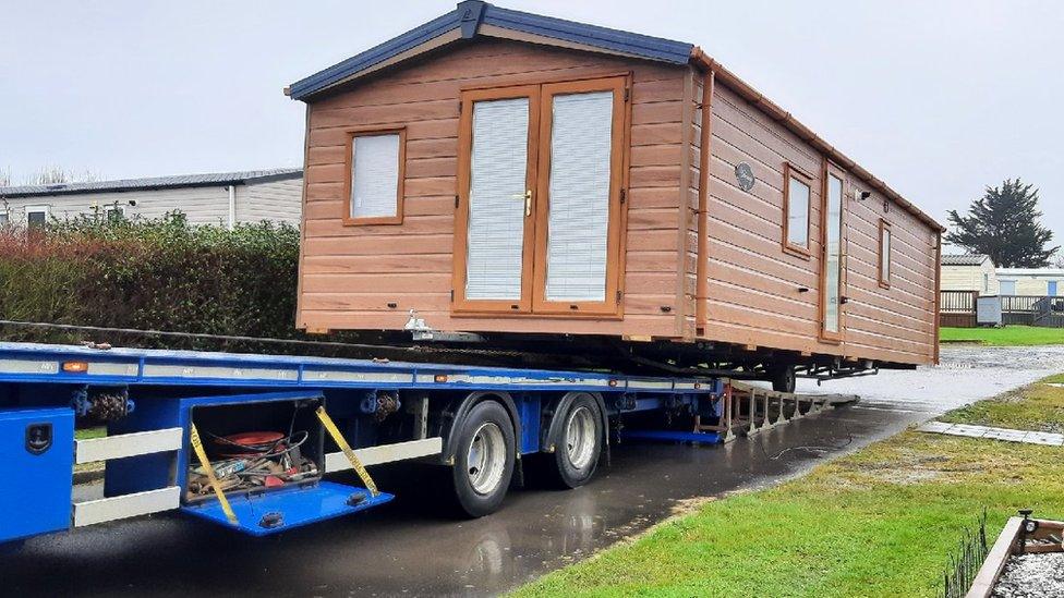 Officers towed the static dwelling from Ballyhalbert on the back of a flatbed lorry after getting a court order.