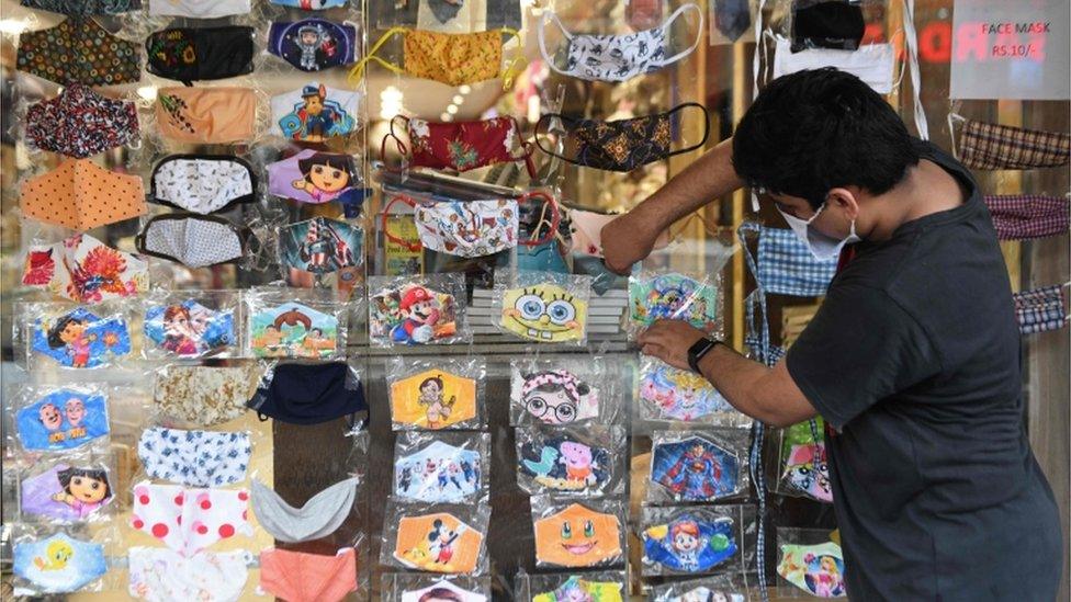 Man selling children's facemasks