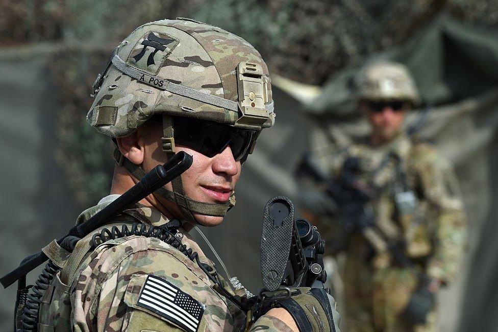 A US soldier stands guard at an Afghan National Army base in the eastern province of Nangarhar