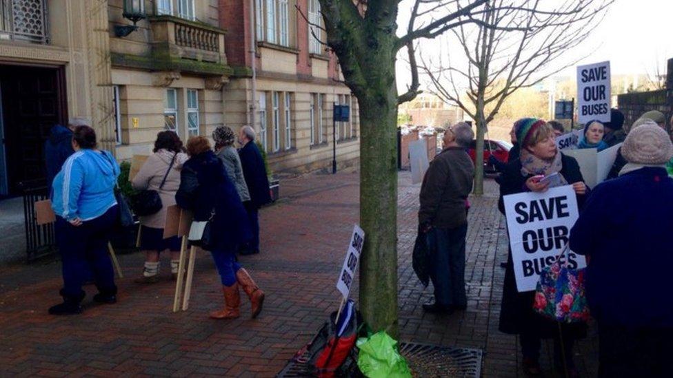 Campaigners outside budget meeting (Arif's tweet)