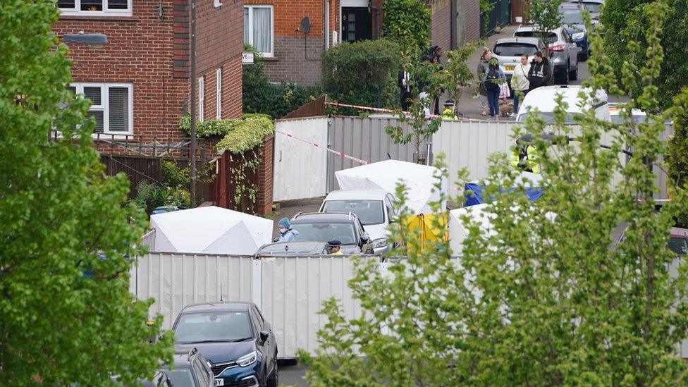 Forensic officers at the scene of the stabbings