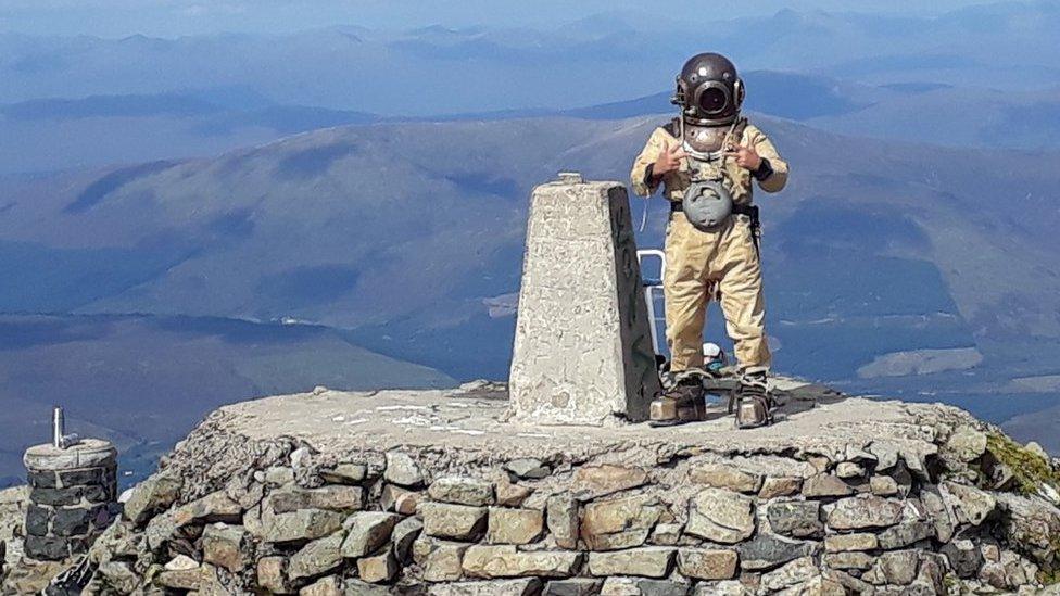 Diver on summit of Ben Nevis