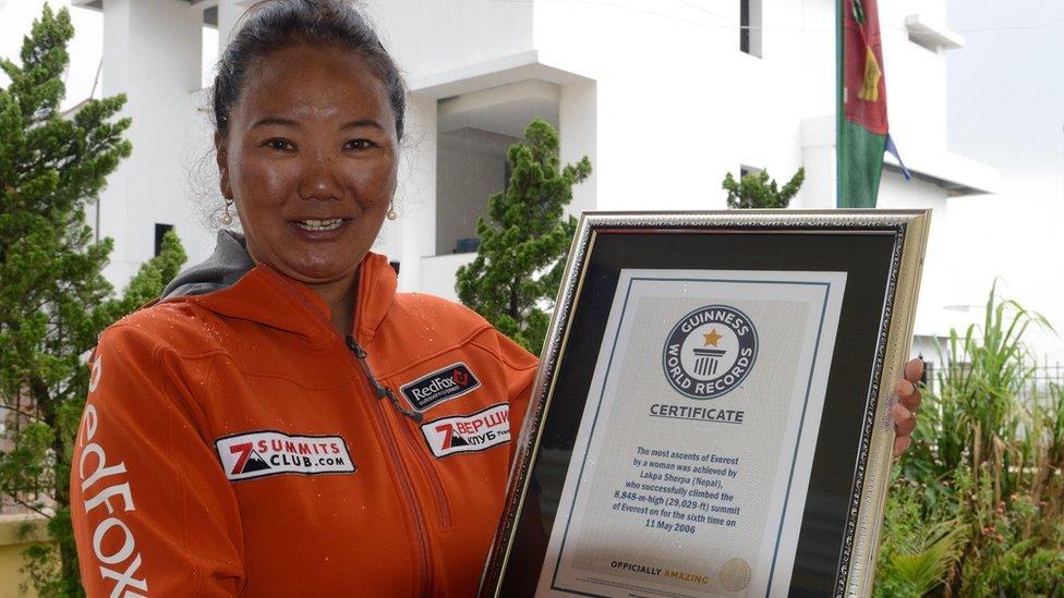 Lhakpa Sherpa with her certificate for a previous record