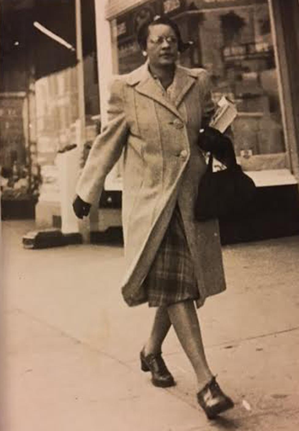 Miriam Mann walking down the street