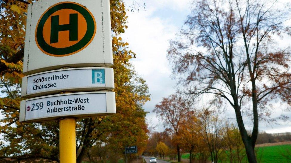 A bus stop is pictured on November 20, 2020 in an area where walkers found on November 8 parts of bones that were identified as human bones