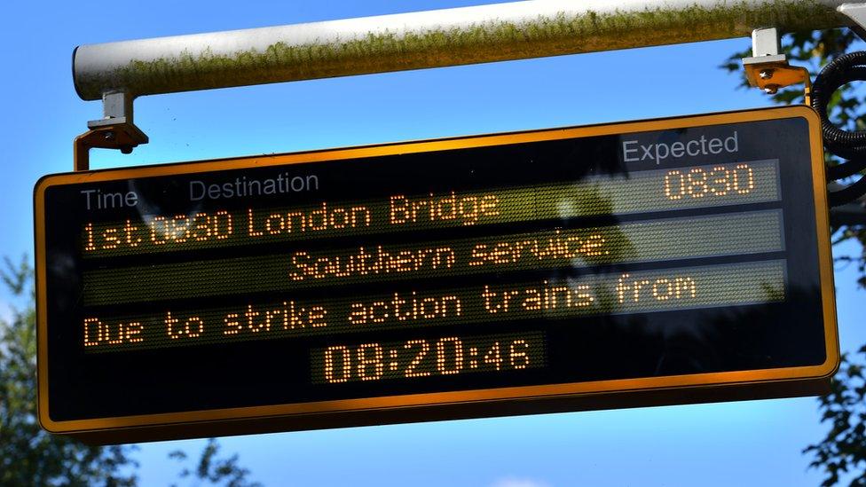 Rail sign indicating delays due to strike