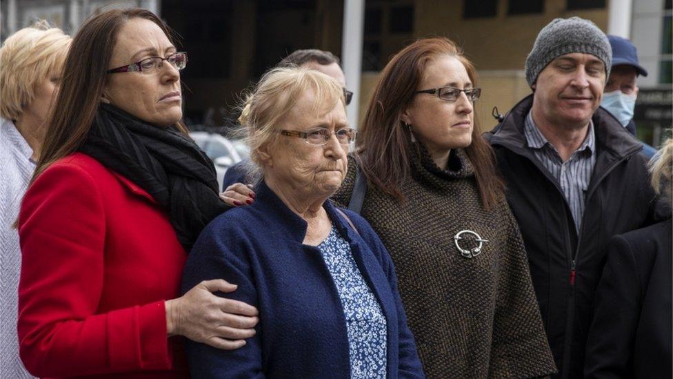 Mr McCann's daughters Maura and Aíne with his widow Anne and son Fergal