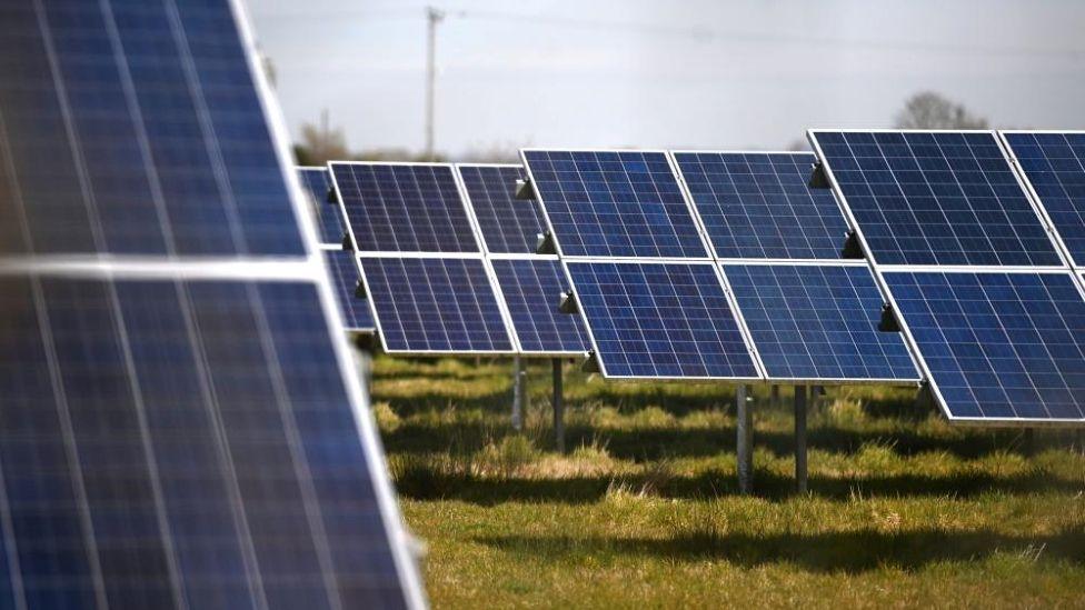 Solar panels in a field