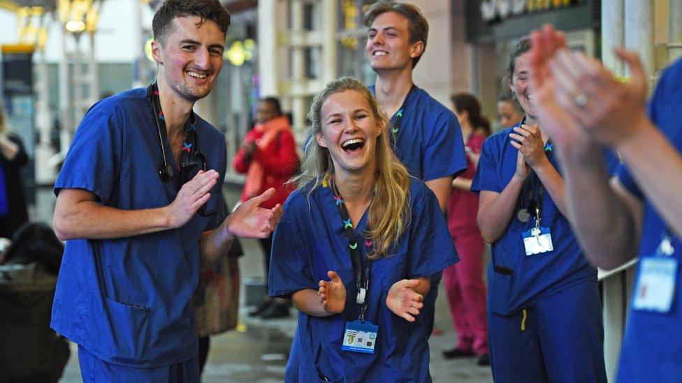 Medics outside the Chelsea and Westminster Hospital in London join in