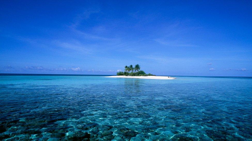 The island of Dunikolu in the Republic of Maldives in the Indian Ocean.