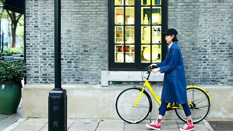 Woman with a bike