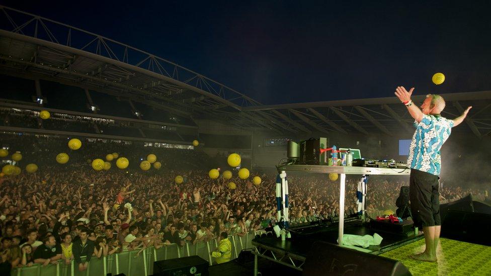 Fatboy Slim performing at the Amex stadium in 2012