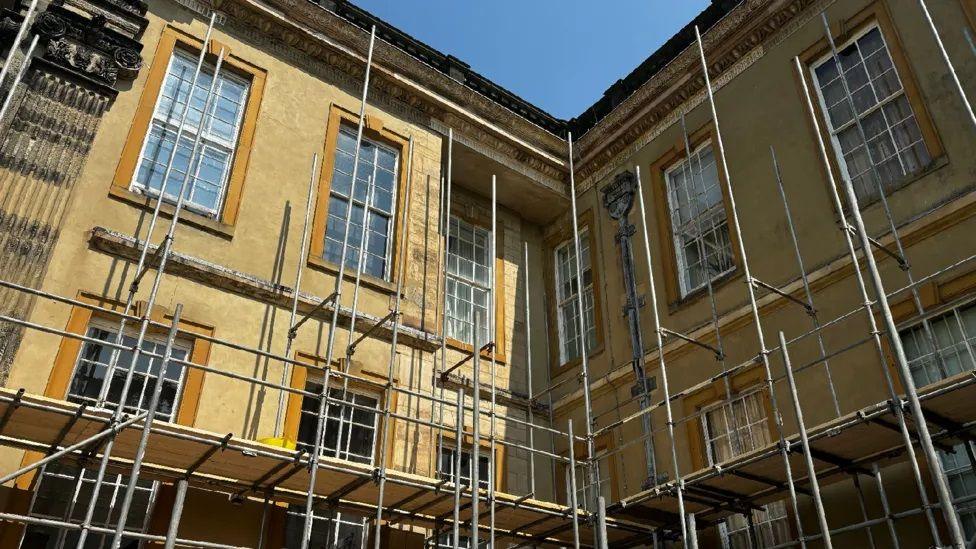 Scaffolding over the internal courtyard walls at Calke Abbey