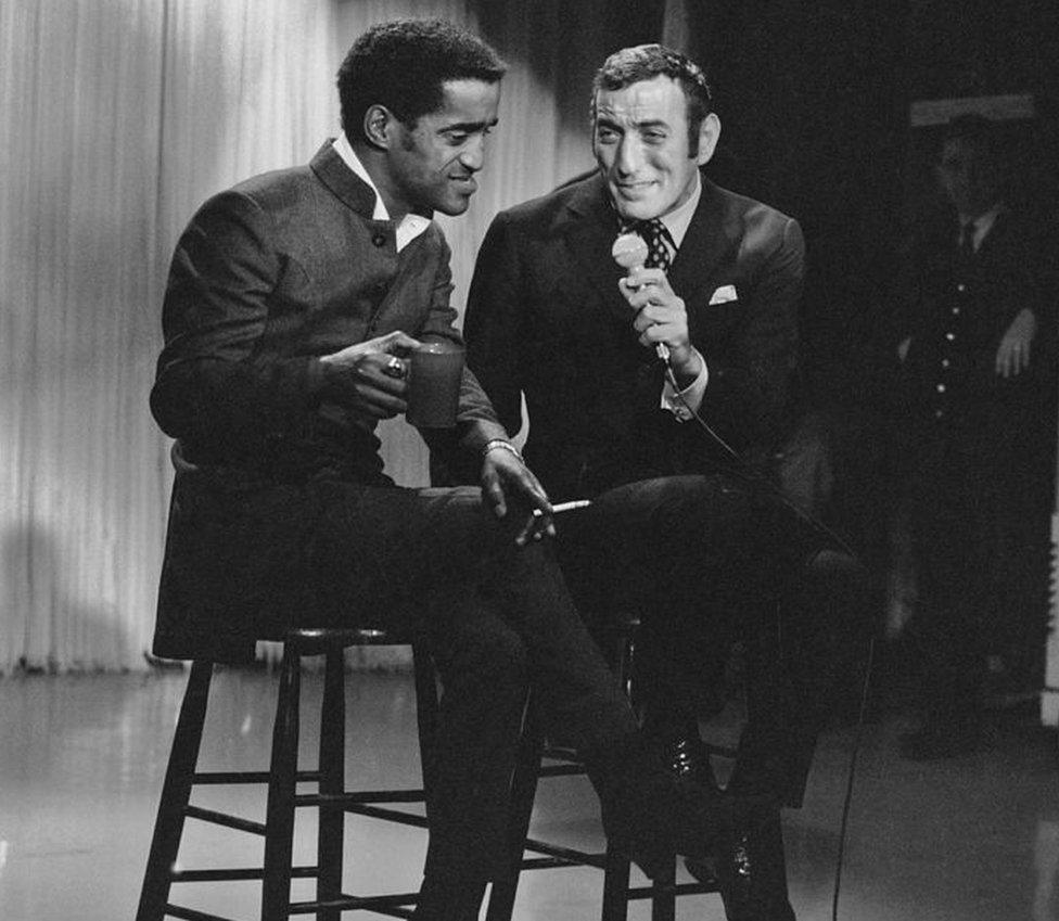 Sammy Davis Jr and Tony Bennett performing together on a television show in 1960