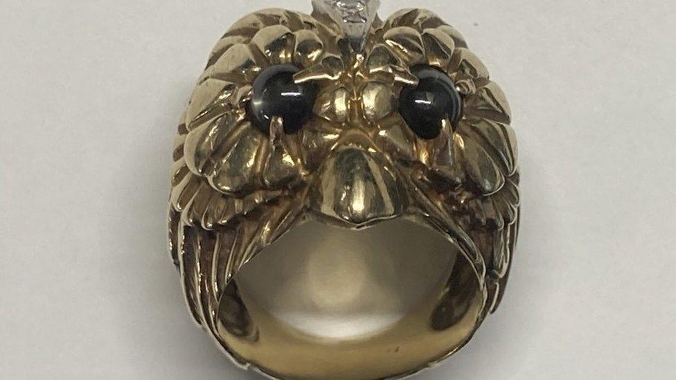 A 14karat gold owl-shaped ring