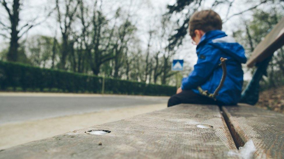 Boy on a bench