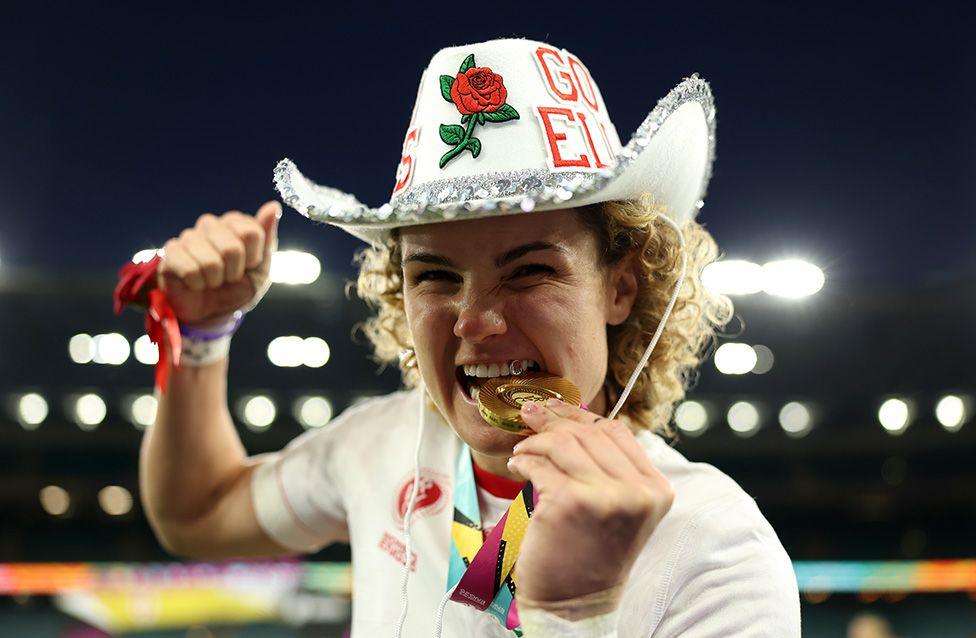 Ellie Kildunne of England bites her medal as she celebrates victory in the Women's Rugby World Cup 2025 Final match between Canada and England in London. Photo by Alex Davidson