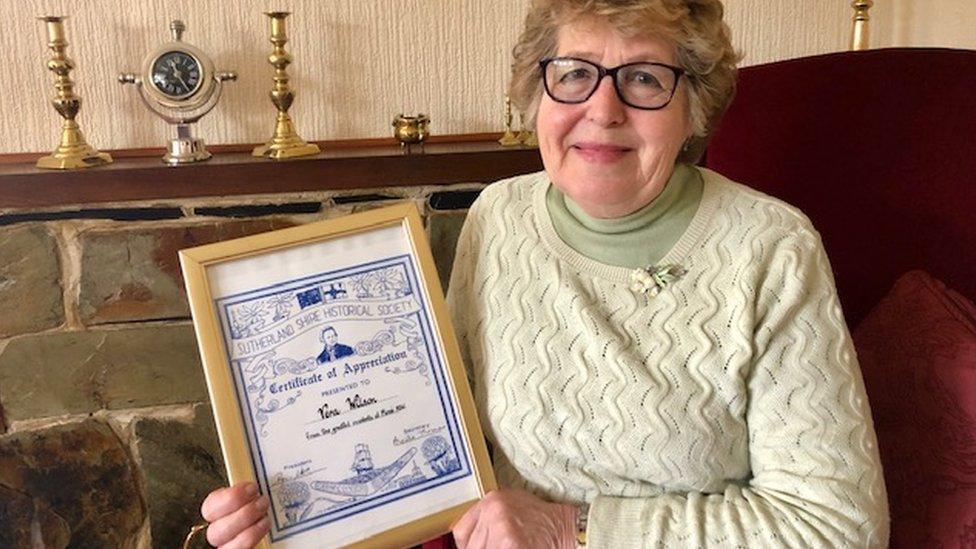 Vera with a certificate from Sutherland Shire Historical Society