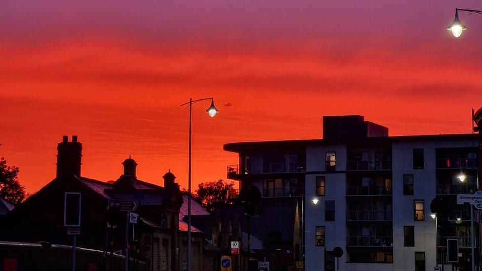 Deep orange sunset above Birmngham