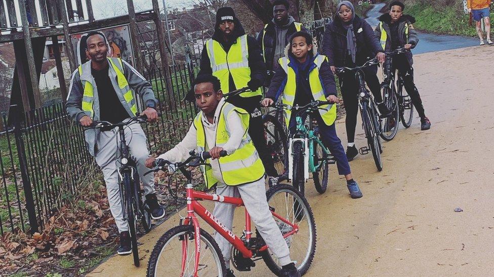 A group of young people cycling with mentors at Bristol Somali Youth Voice