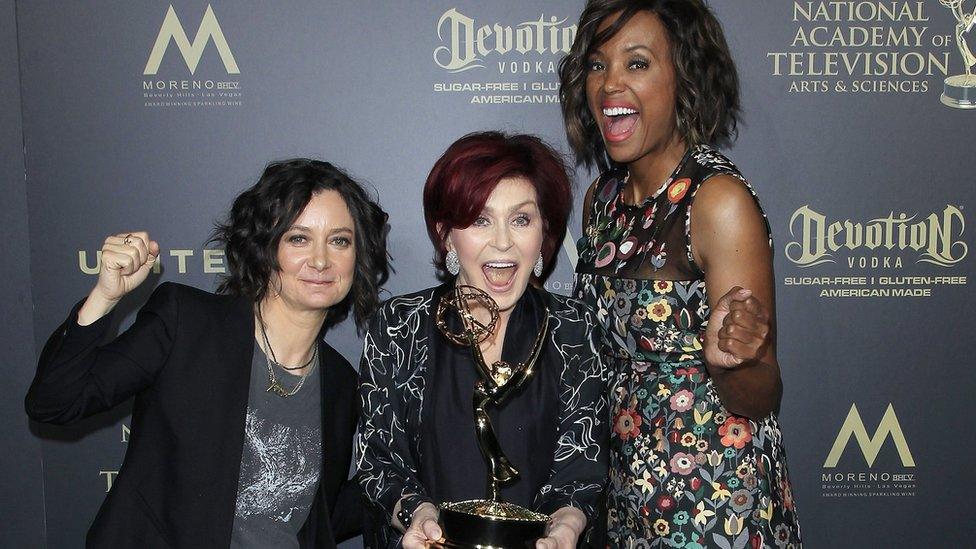 US actress Sara Gilbert (L), British television host Sharon Osbourne (C) and US talk show host Aisha Tyler (R) all co-hosts of the show The Talk, pose after winning an Emmy Award in the Outstanding Entertainment Talk Show Host category