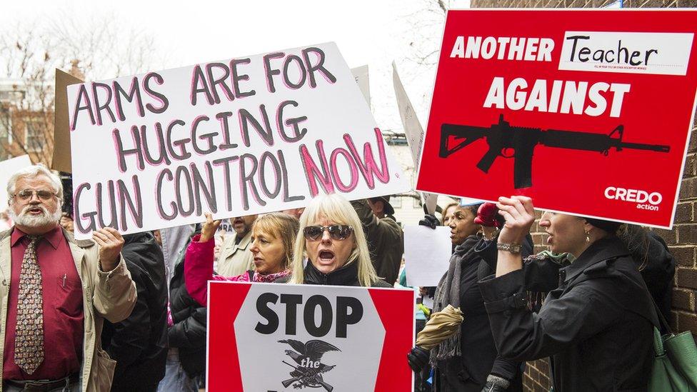 Protesters descend on the offices of the NRA (National Rifle Association)in Capitol Hill in Washington DC following the shooting at Sandy Hook Elementary School, 17 December 2012