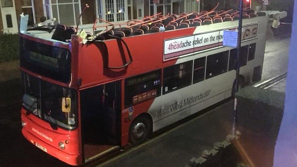 The bus missing its roof