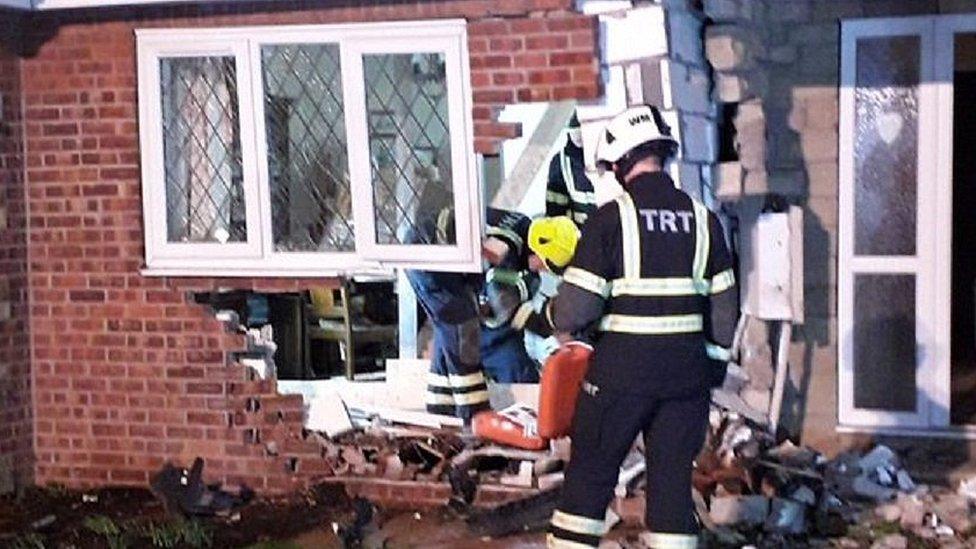 Damage after car hit house